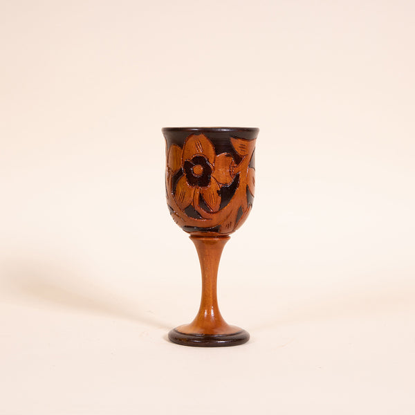 Contrasting hand-carved wooden wine goblet  Measures 3" diameter x 7.25" tall  Handwash only  *Note that due to the vintage status of wear - while we clean as thoroughly as we can, there may be some sun stains still existing.  Please examine the photos closely before making your purchase.  If you would like more information or have any other specific questions regarding the condition - email found@thehiddenhome.store*