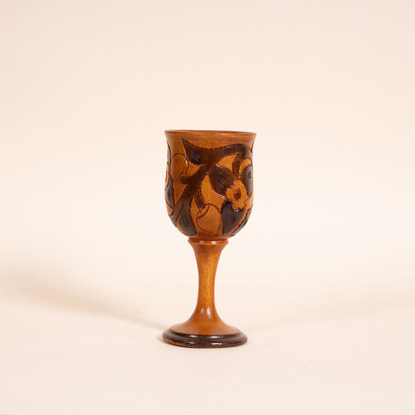 Contrasting hand-carved wooden wine goblet  Measures 3" diameter x 7.25" tall  Handwash only  *Note that due to the vintage status of wear - while we clean as thoroughly as we can, there may be some sun stains still existing.  Please examine the photos closely before making your purchase.  If you would like more information or have any other specific questions regarding the condition - email found@thehiddenhome.store*