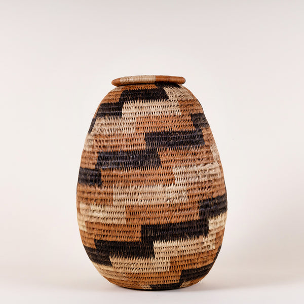 Vintage Woven Basket with Lid  Great for dried florals in any room  Measures 6" at widest x 11" tall (3.75" diameter Lid)  *Note that due to the vintage status of wear - while we clean as thoroughly as we can, there may be some sun stains still existing.  Please examine the photos closely before making your purchase.  If you would like more information or have any other specific questions regarding the condition - email found@thehiddenhome.store*